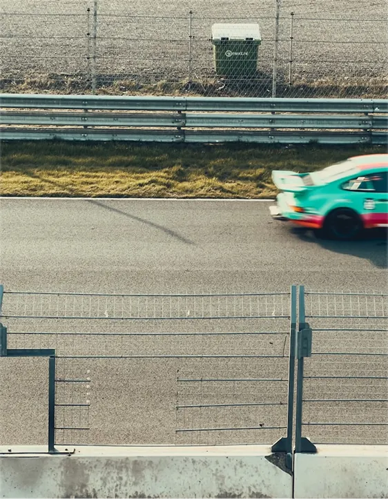 Car on a coastal road, shot from above