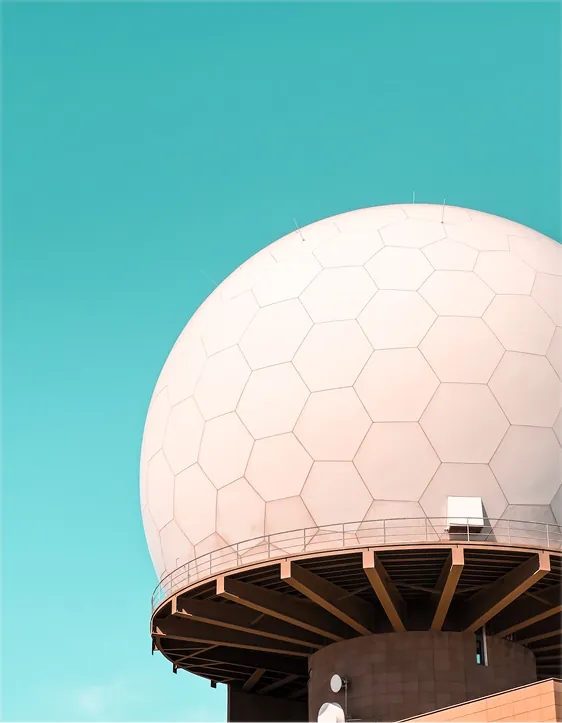 White radar dome against a clear sky