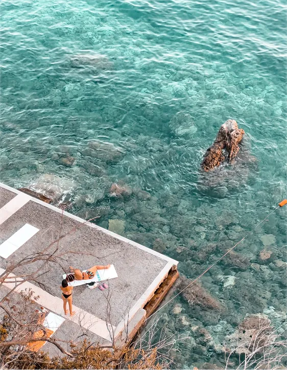 Turquoise sea with a swimming platform