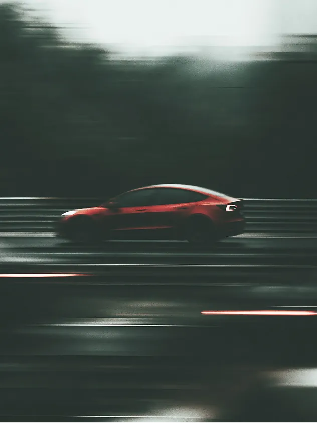 AI-generated image of a red car in motion on a race track